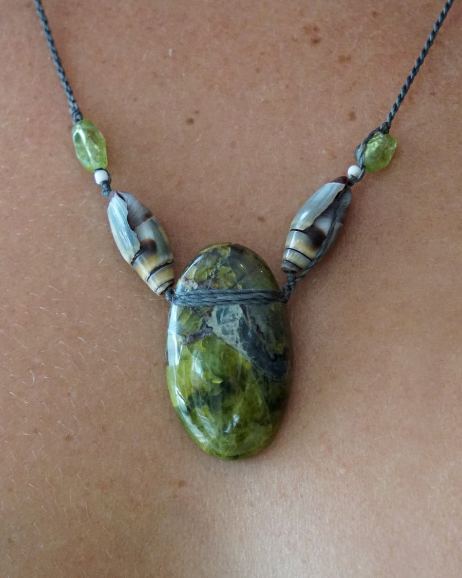 Heart Opening Peridot Shell